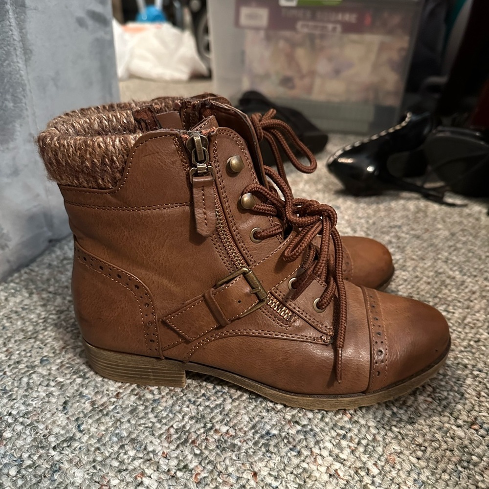 Lightly worn combat boots